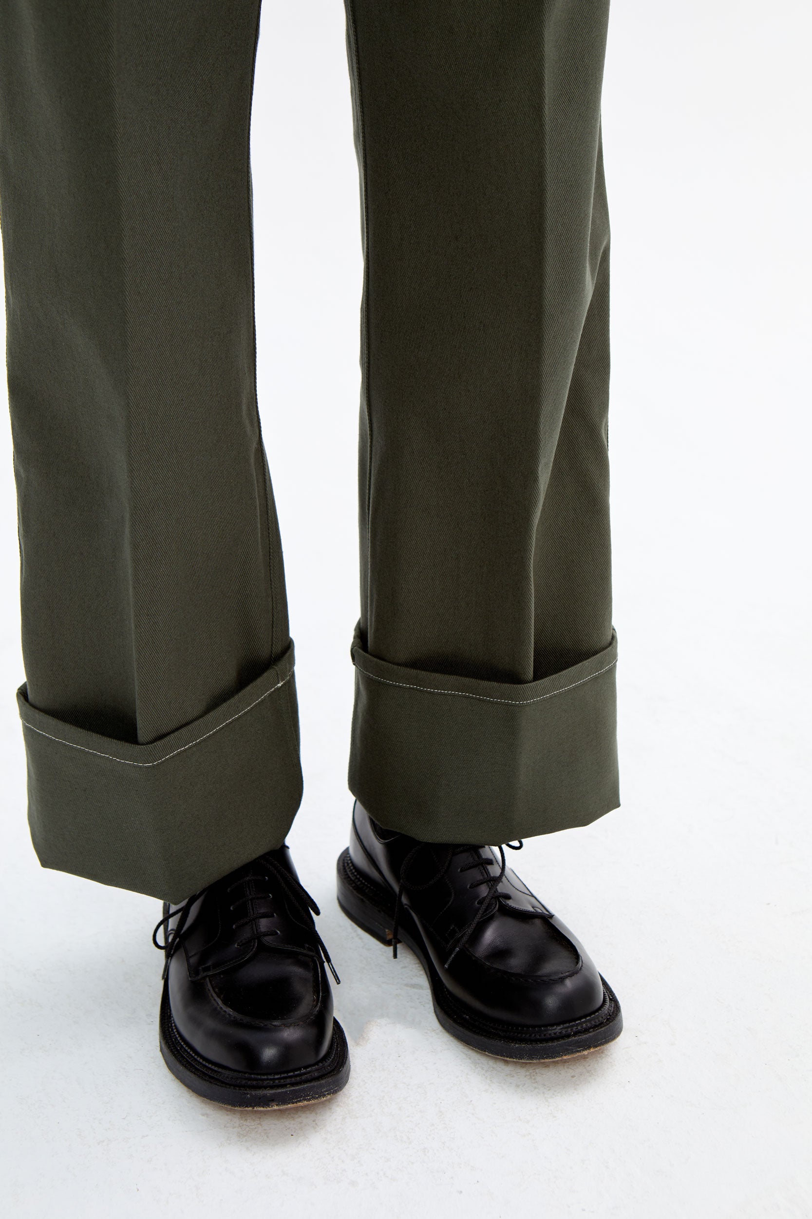 HIGH HEMS CONTRASTED TROUSERS